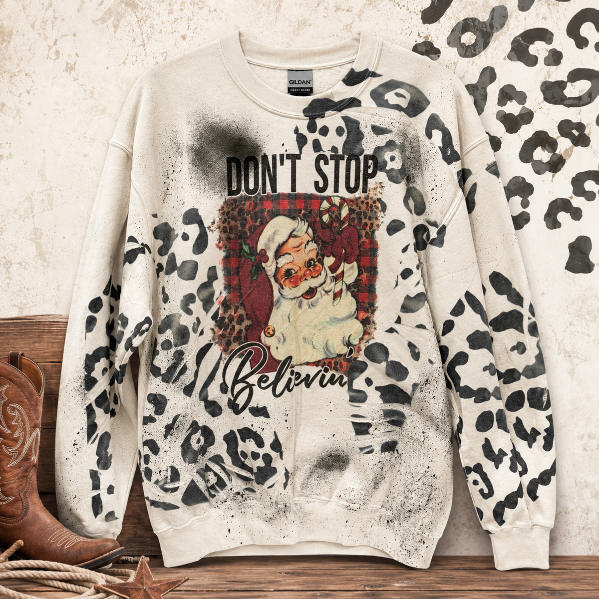 Don’t Stop Believin’ Santa Leopard Sweatshirt